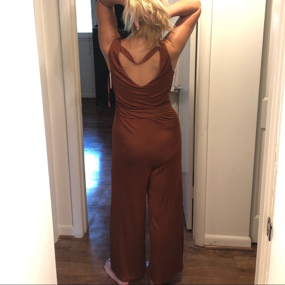 Rust jumpsuit from Anthropology size small